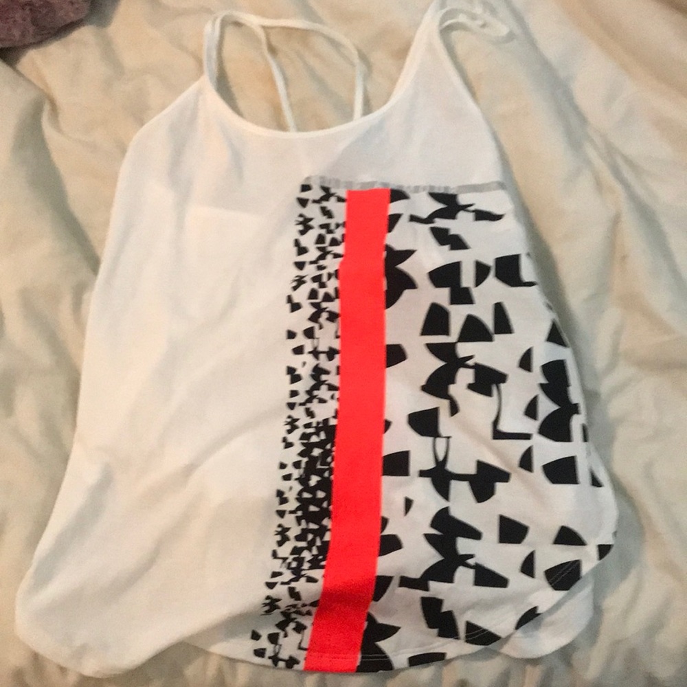 Under amour tank top. Has criss cross backing